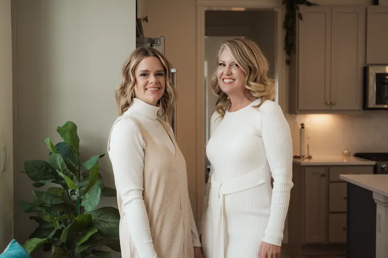 Brandy Unruh, REALTOR® with Compass, Erie, Colorado, with fellow Compass agent Shandel Henry