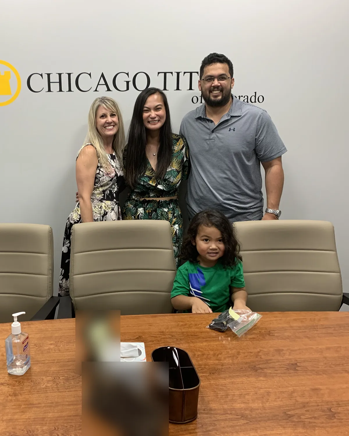 Brandy Unruh, REALTOR® with Compass, celebrating a closing with clients in Colorado